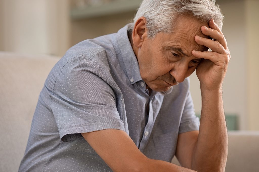 man experiencing pain and suffering in Gainesville and Stuart Florida - pain and suffering - The Eberst Law Firm